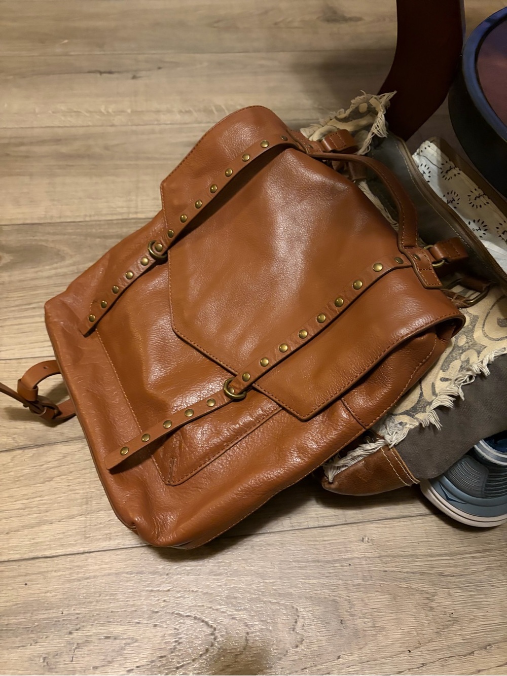 Classic Women’s Tan Leather Backpack purse with Stud Details straps and pockets